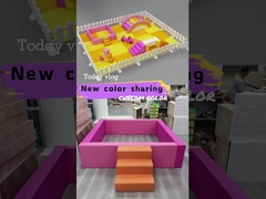 Oranje soft play met ball pit en glijbaan roze rode soft playground binnen